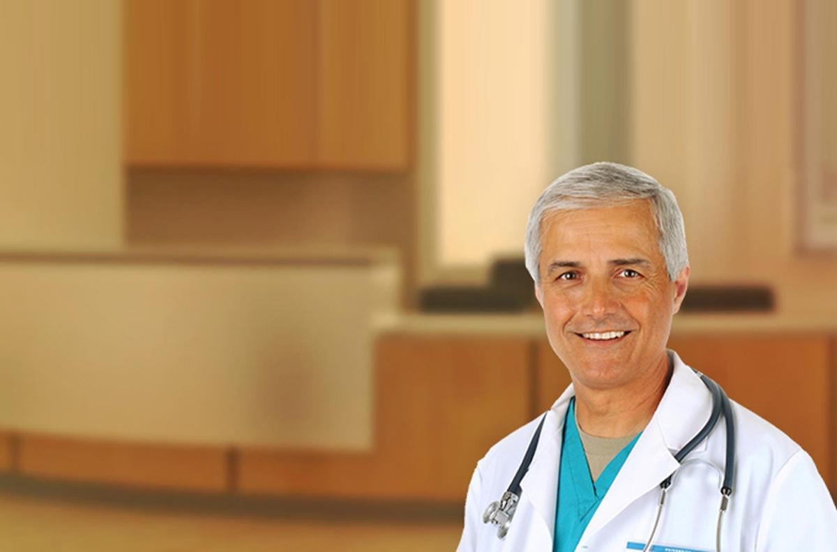 Doctor smiling and posing for the camera